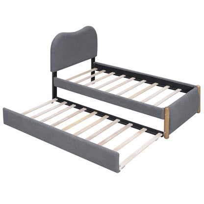 Upholstered Platform Bed With Wood Supporting Feet And Trundle