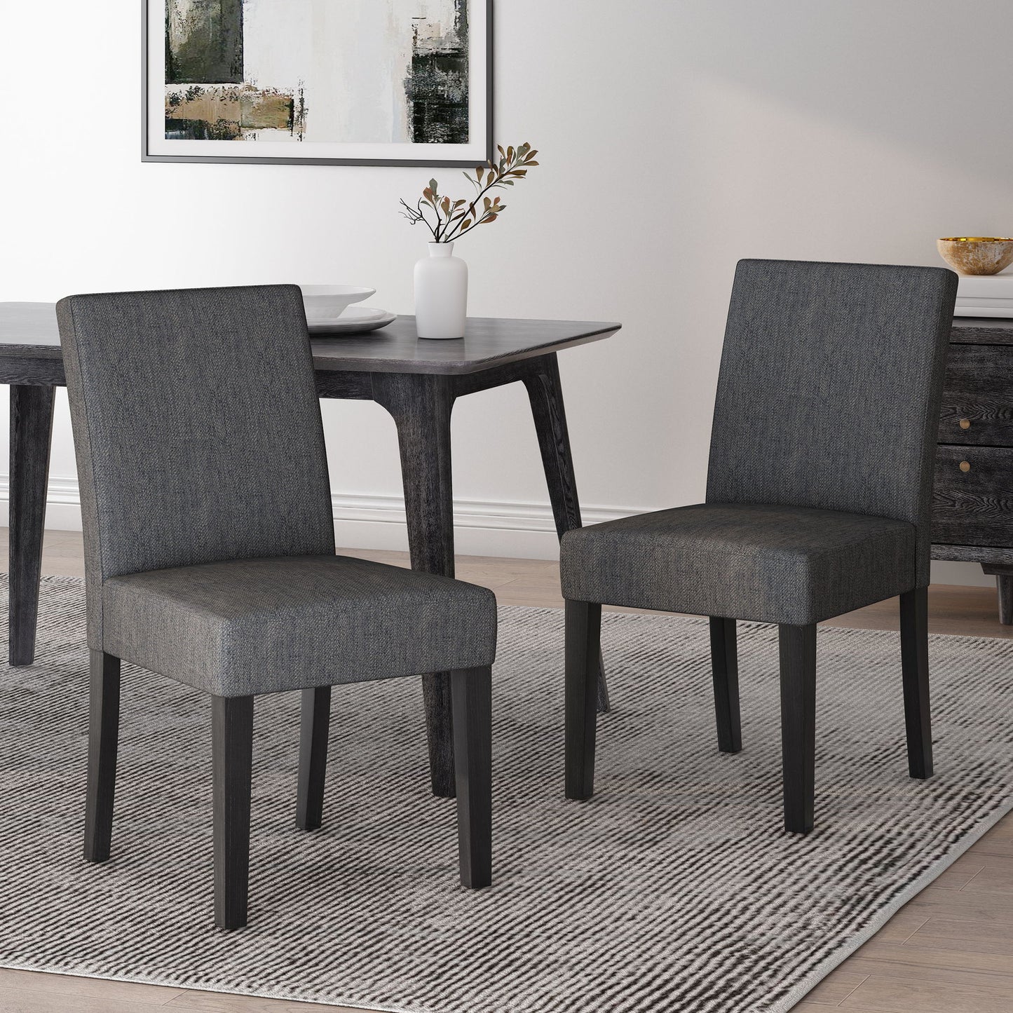 Contemporary Dining Chair With Upholstered Seating And Tapered Legs